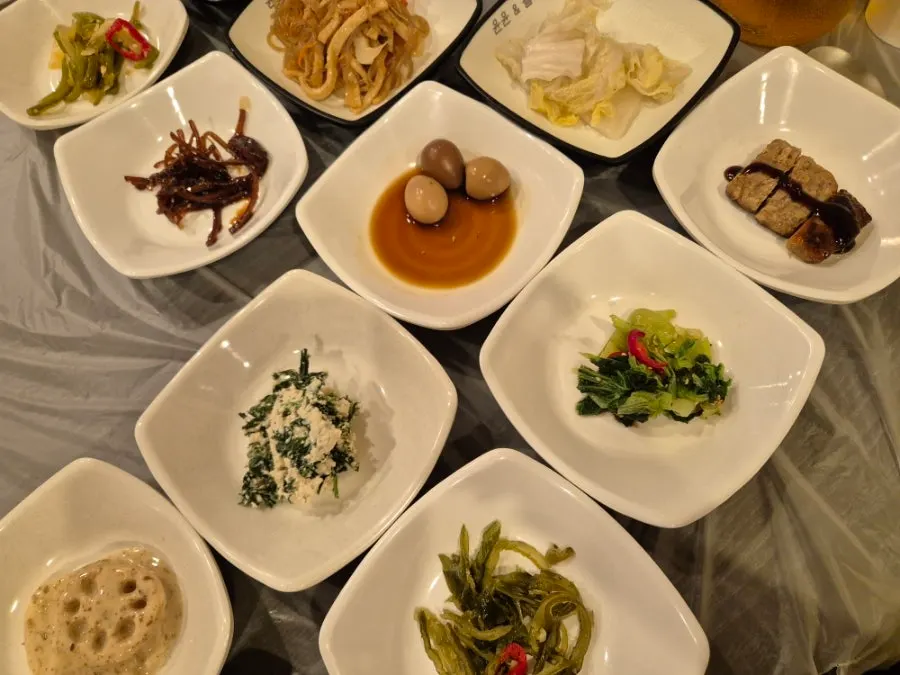 A Korean meal setting with ssambap and side dishes