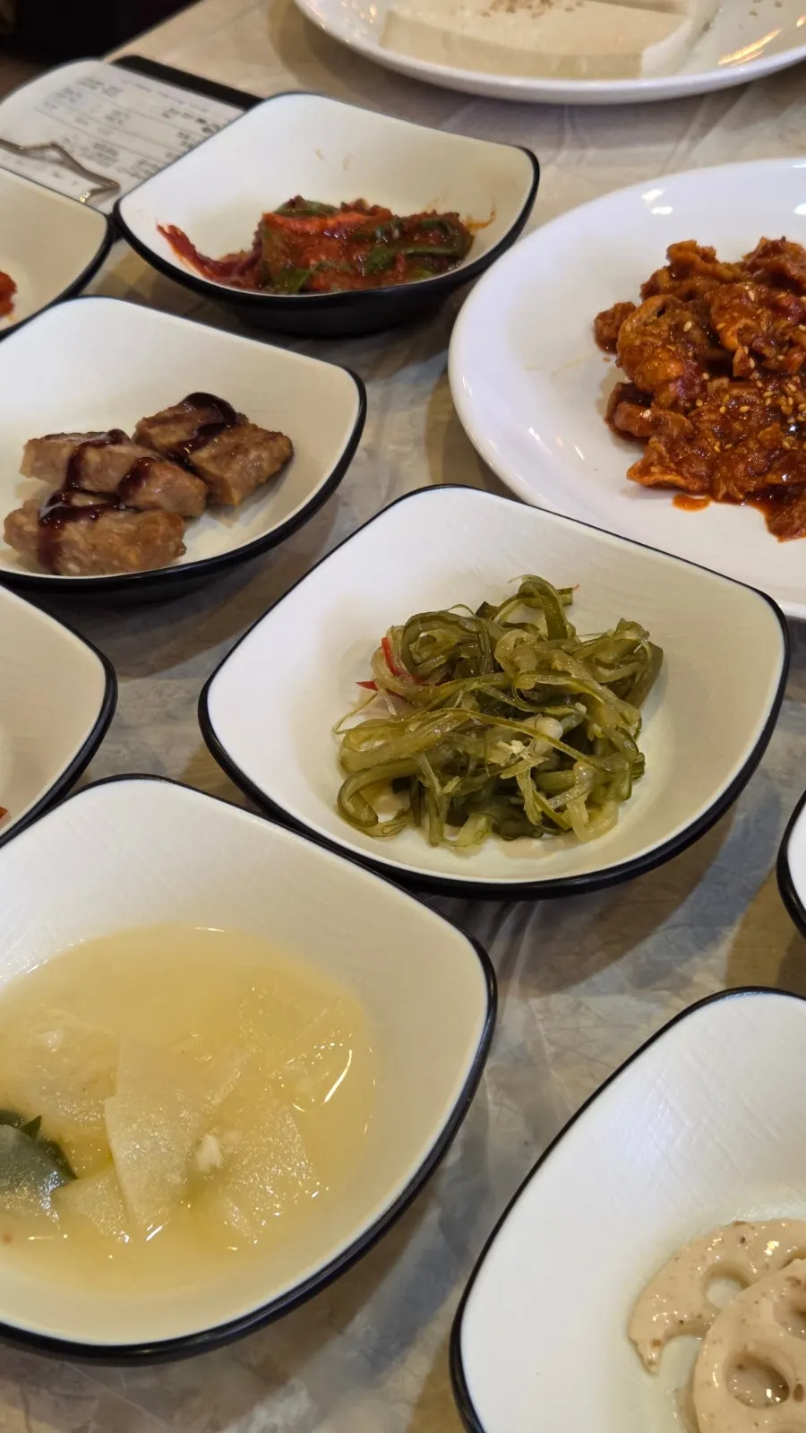 Chive pancake served alongside side dishes