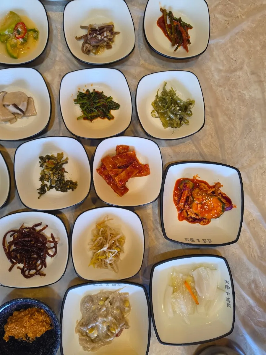 Close-up of salted seafood and seasoned side dishes