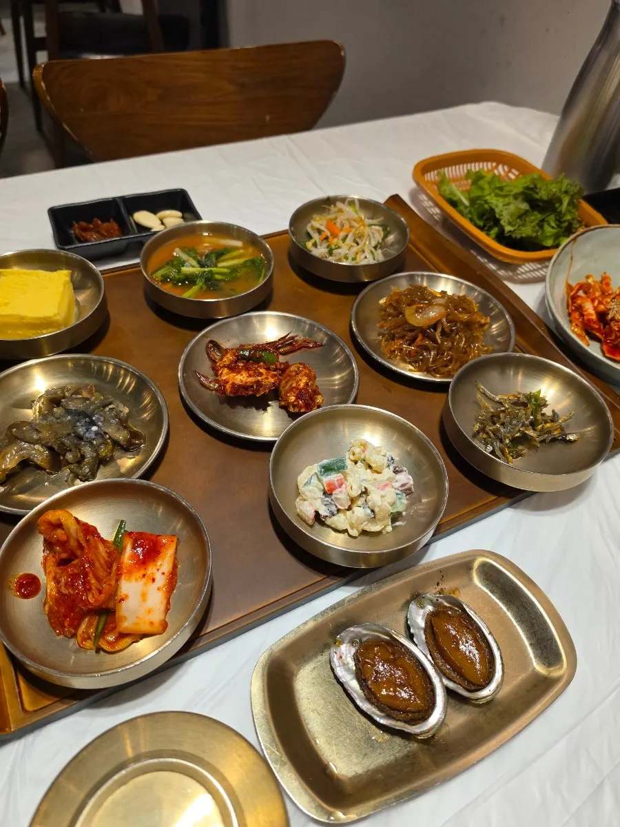Soybean paste stew with grilled bulgogi, kimchi pancake, and grilled mackerel