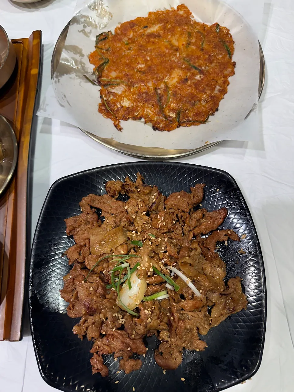 Banchan and table setting before the main dish