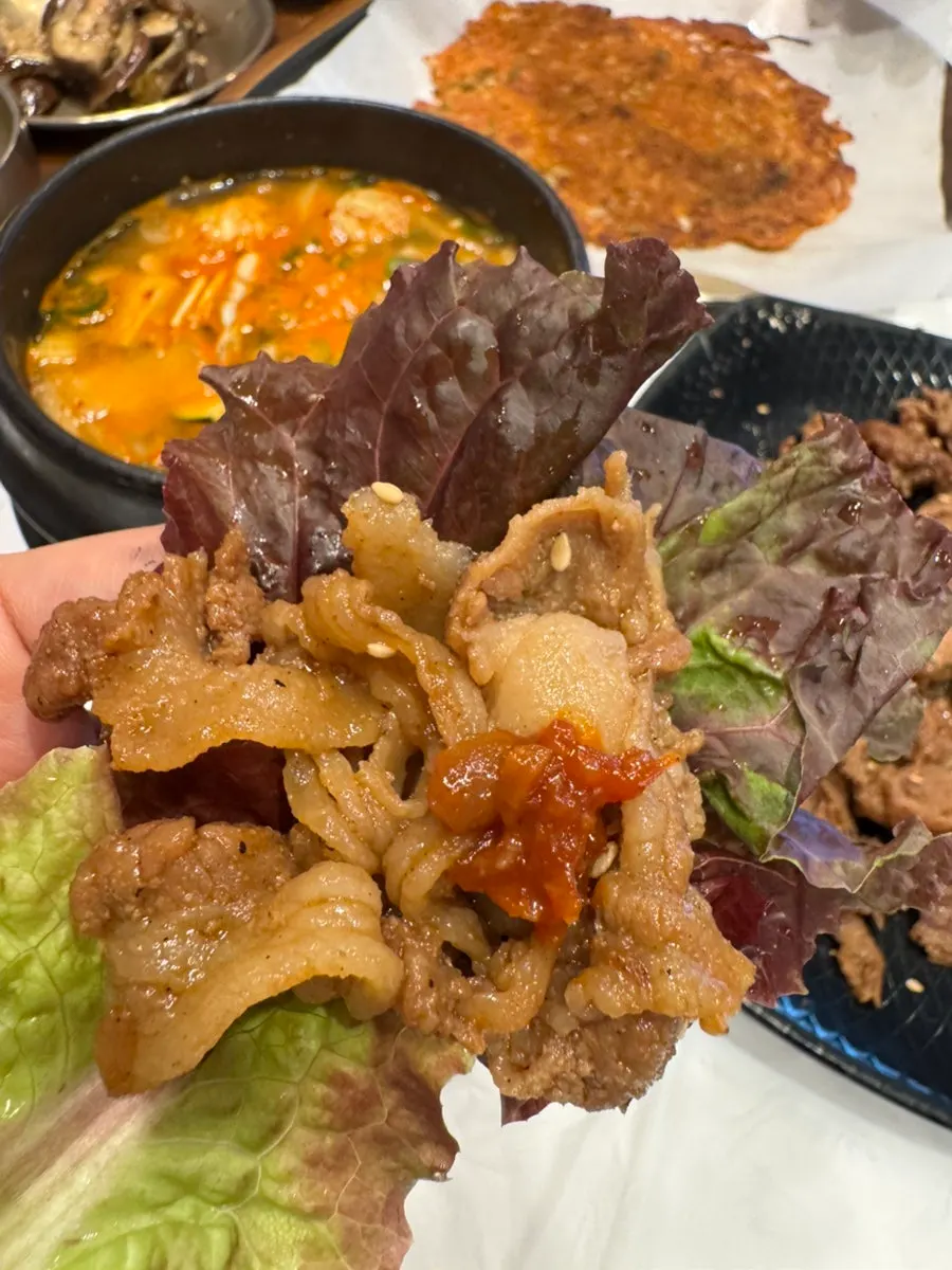 Bulgogi wrapped in lettuce and perilla leaf