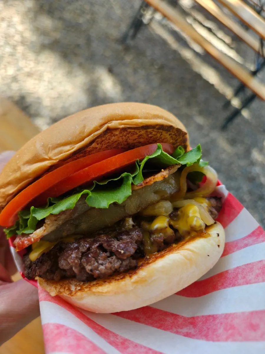 Handmade burger on the outdoor table