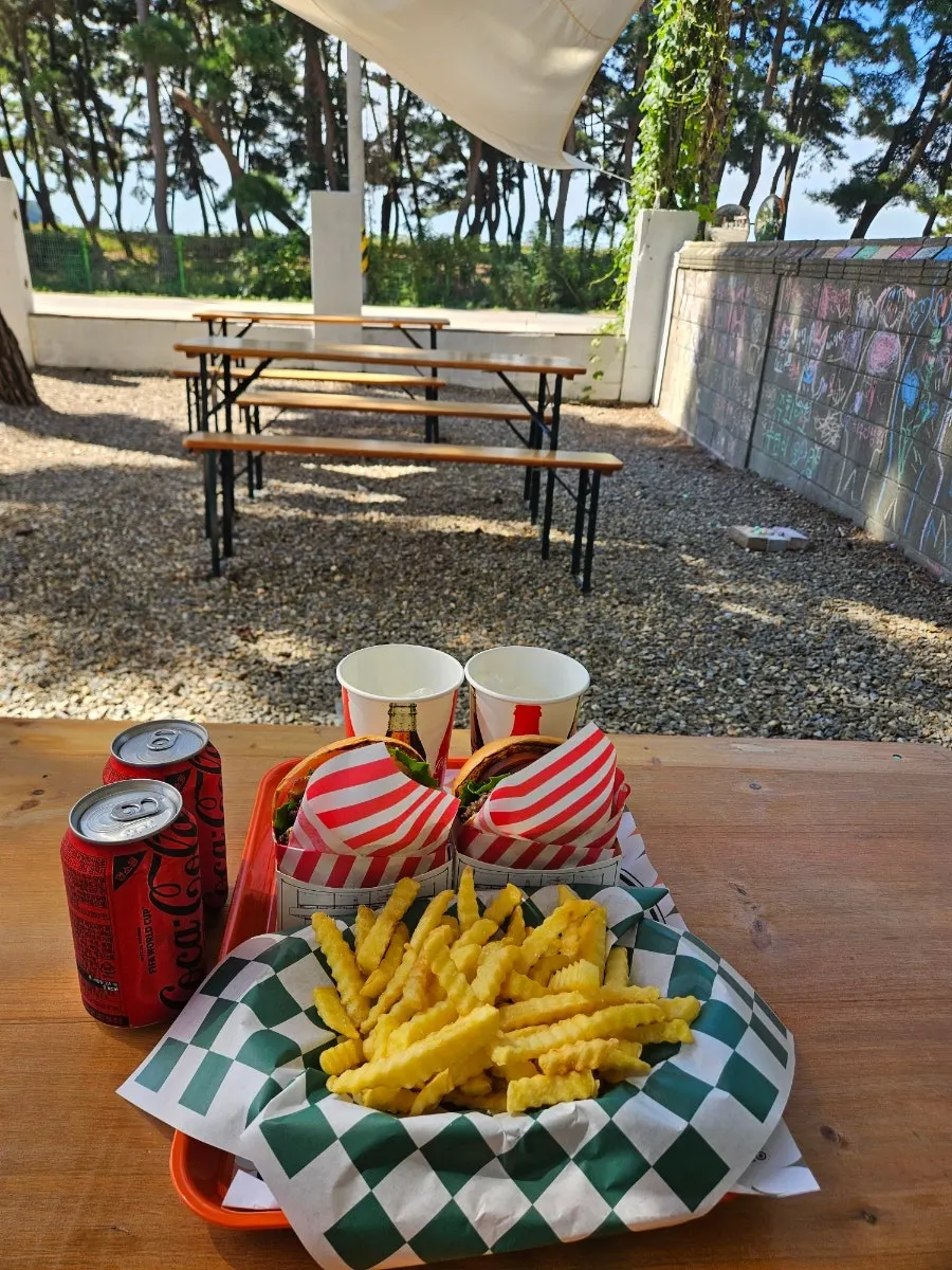 Burger and side set enjoyed on the terrace