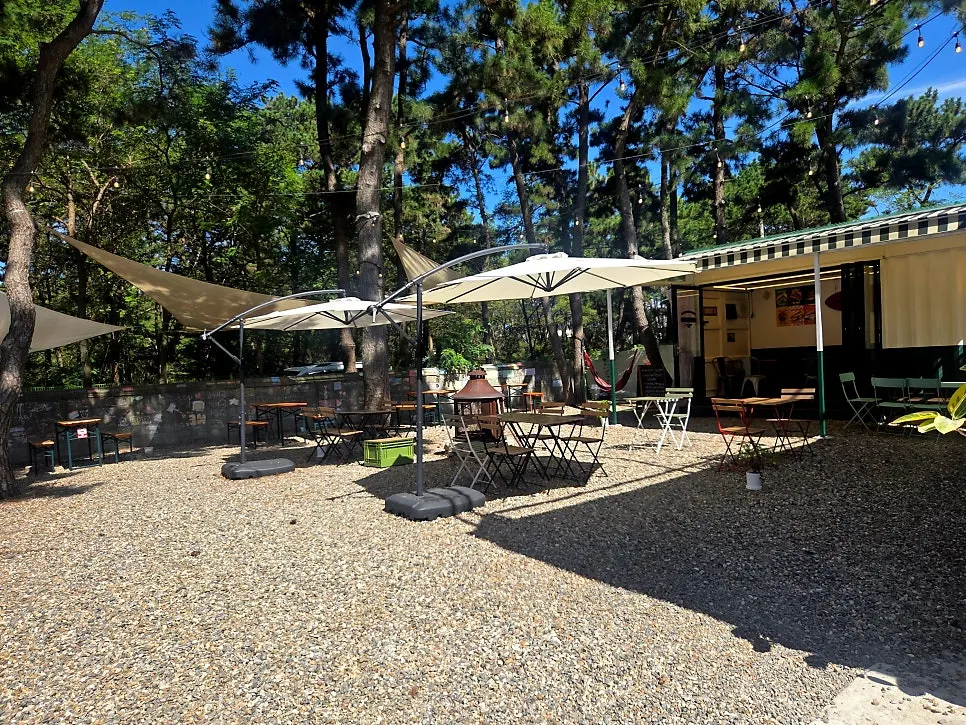 Outdoor area at Masian 300 with parasols