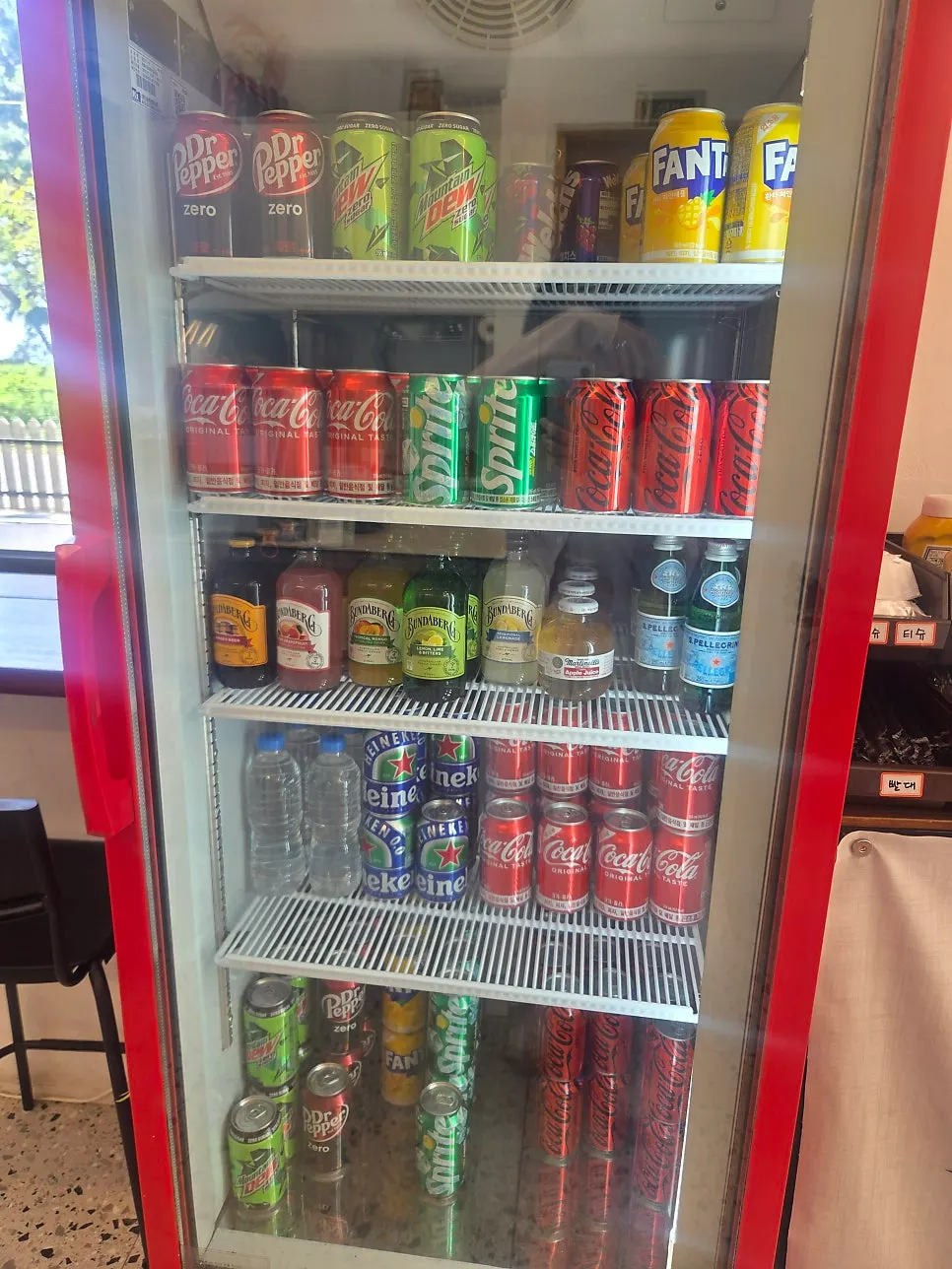 Self-serve fridge with drinks