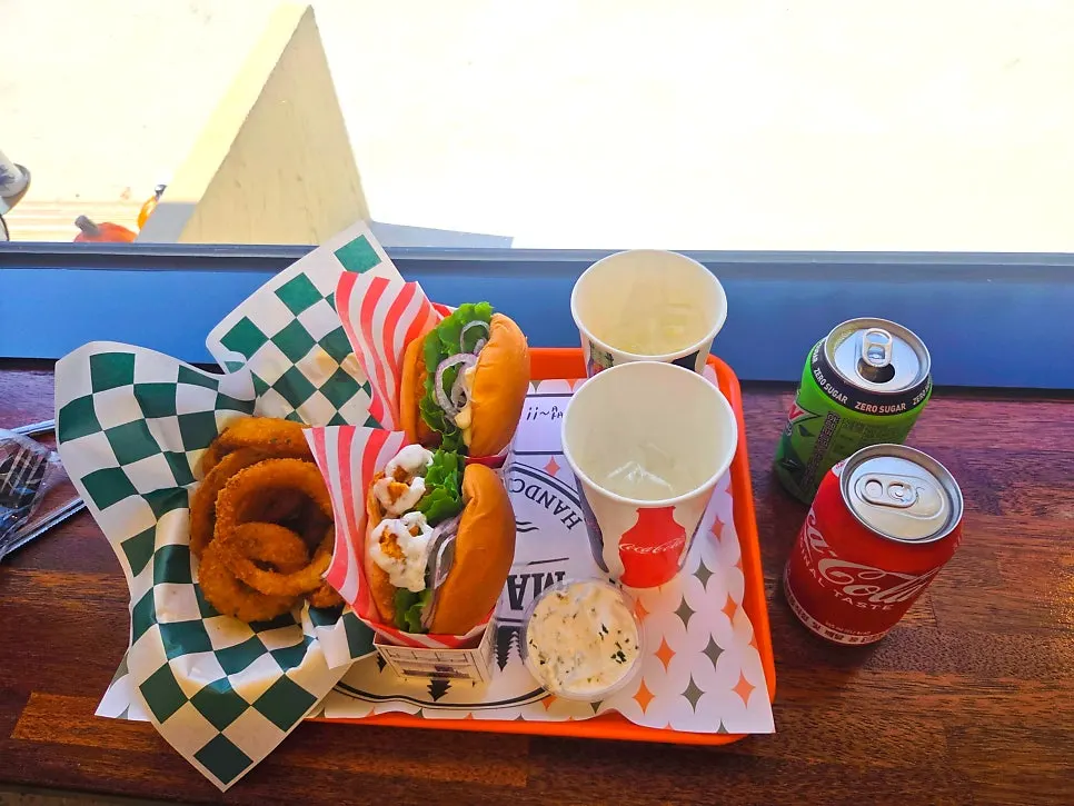 Table spread of Masian 300 handmade burgers