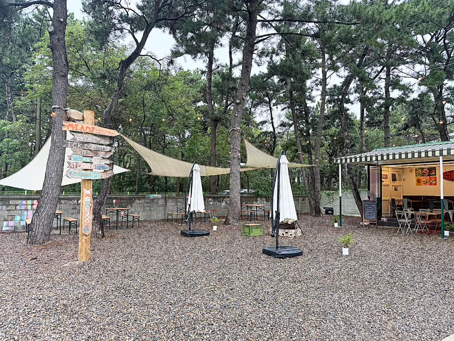 Rainy-day view of the beach in front of Masian 300