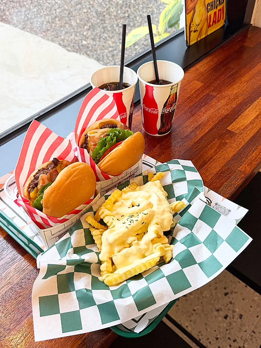 Full spread of chef-made handmade burgers