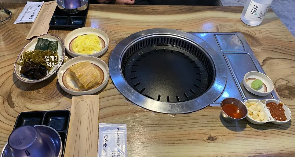 Table set with two servings of aged pork belly