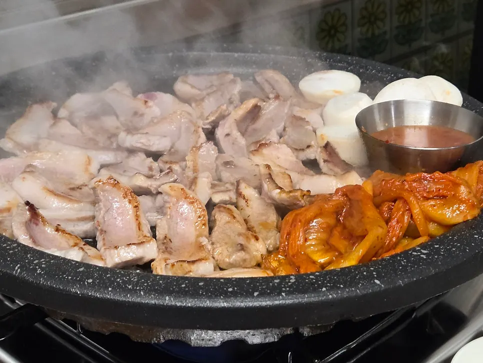 Gabrisal cooking on the heated grill