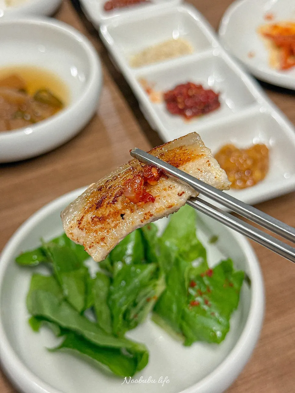 Jjondeuksal with grilled potatoes, mushrooms and kimchi