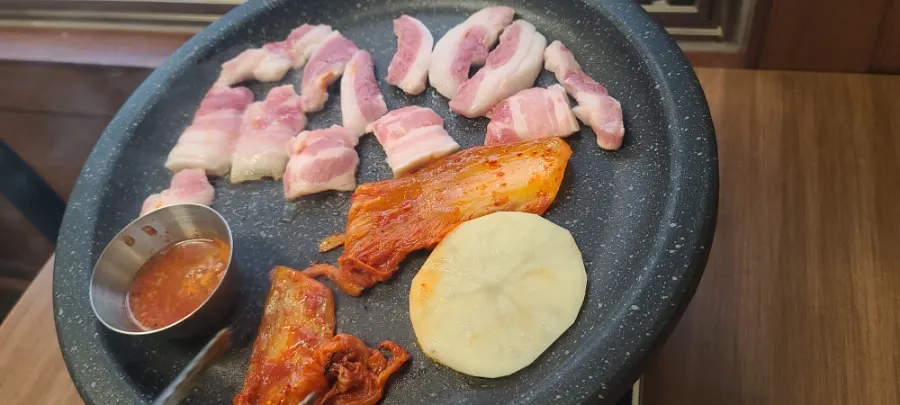 2 servings of special pork belly and 1 serving of gabrisal before grilling