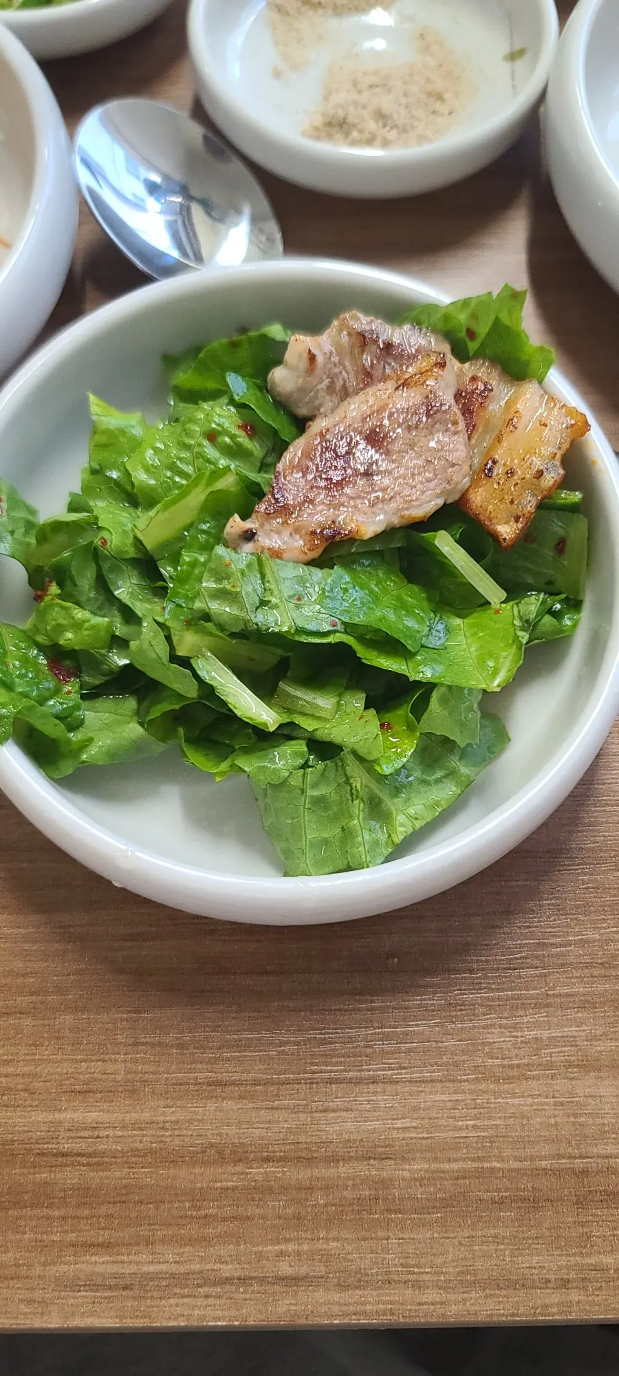Pork belly and kimchi grilling on the pan