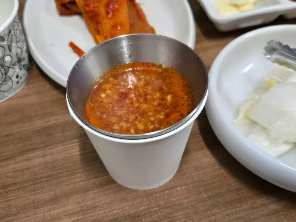 Garlic oil sauce transferred into a paper cup