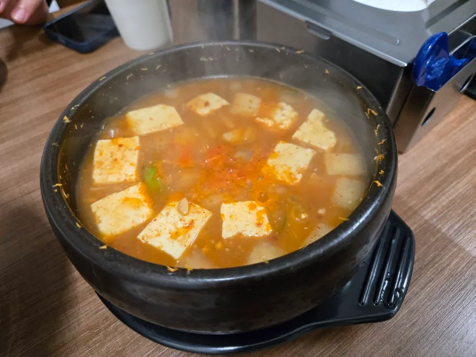 Doenjang jjigae loaded with tofu, served with rice