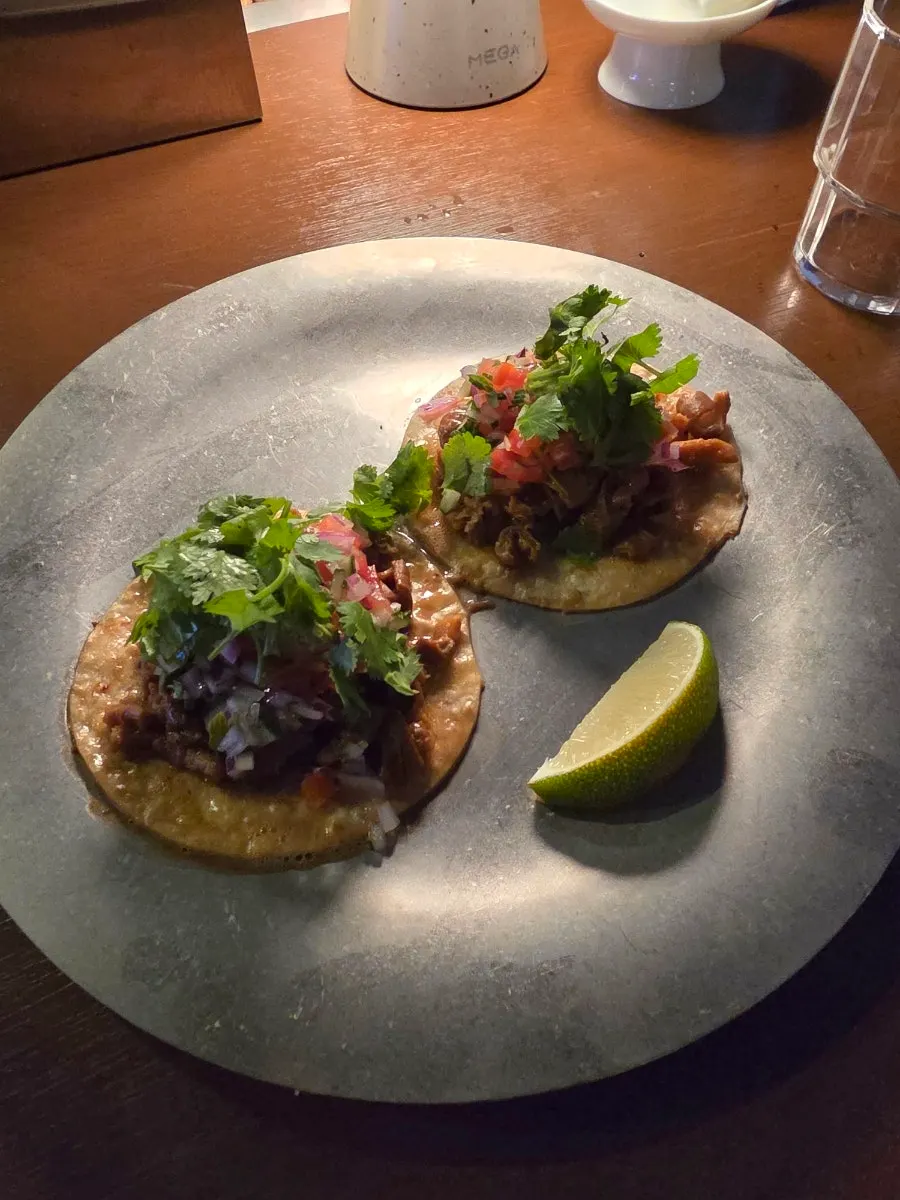 Tripe tacos topped with cilantro