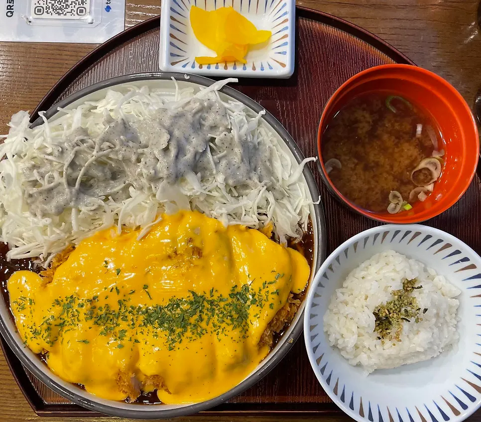 Spicy cheddar tonkatsu piled with cheddar cheese