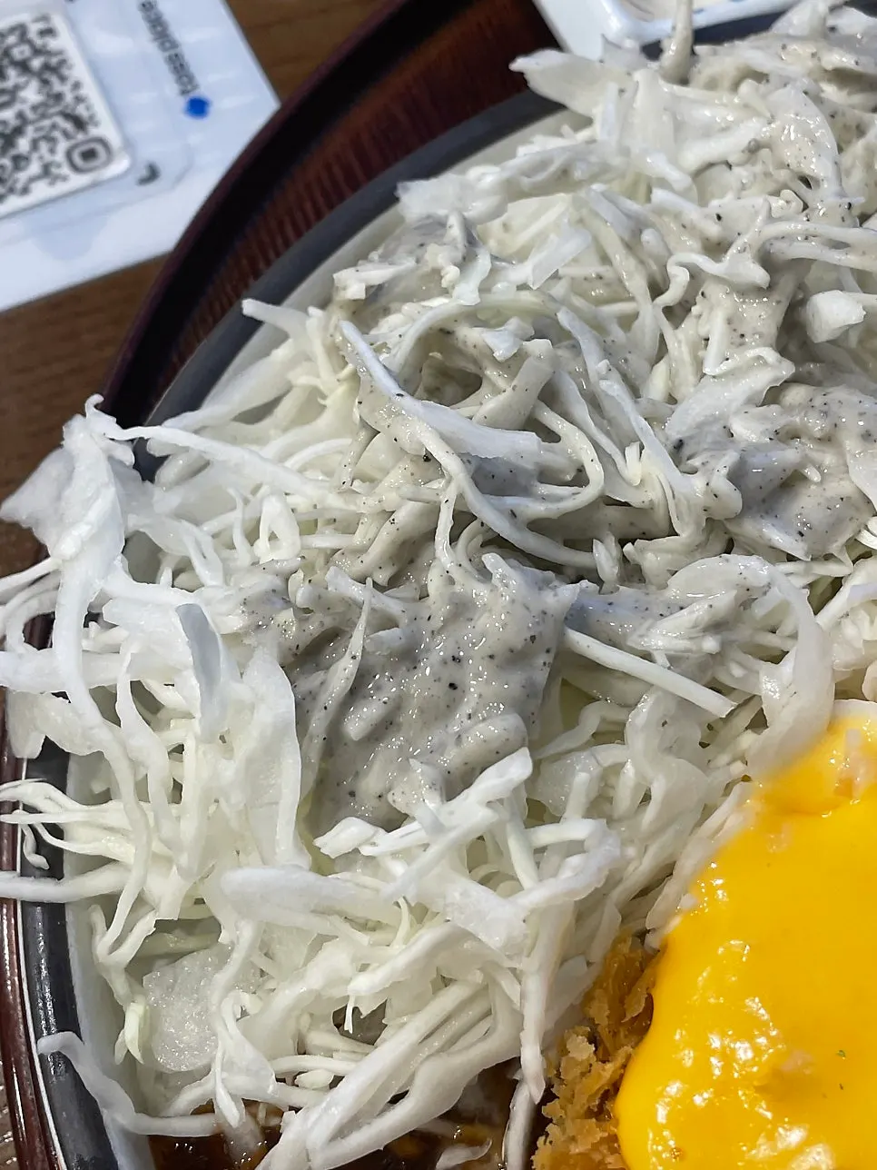 Cabbage salad served with spicy cheddar tonkatsu