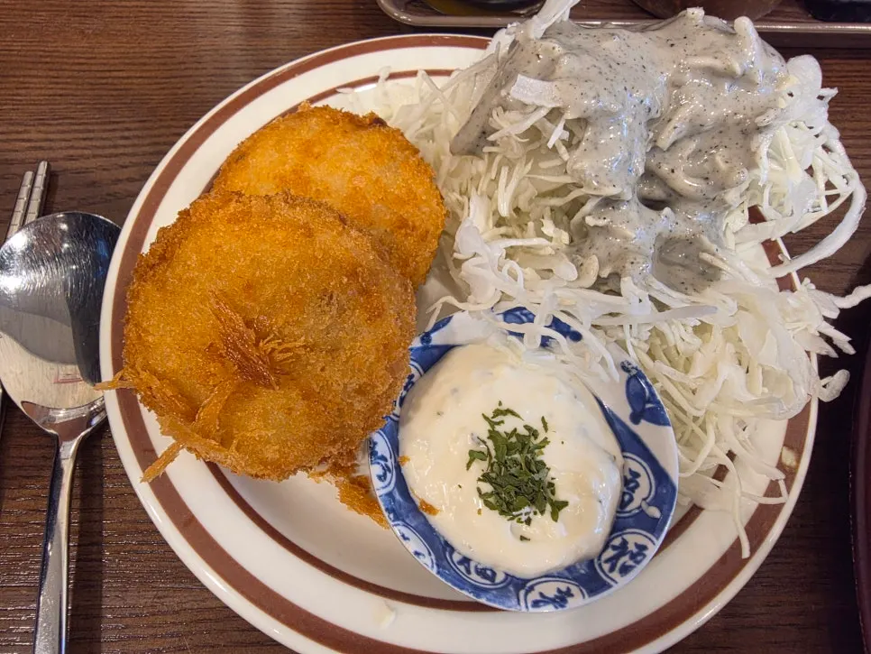 Signature mazesoba topped with an egg yolk