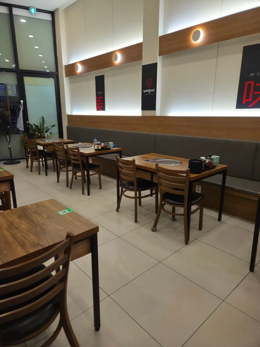 High-ceilinged dining hall interior at Mayway
