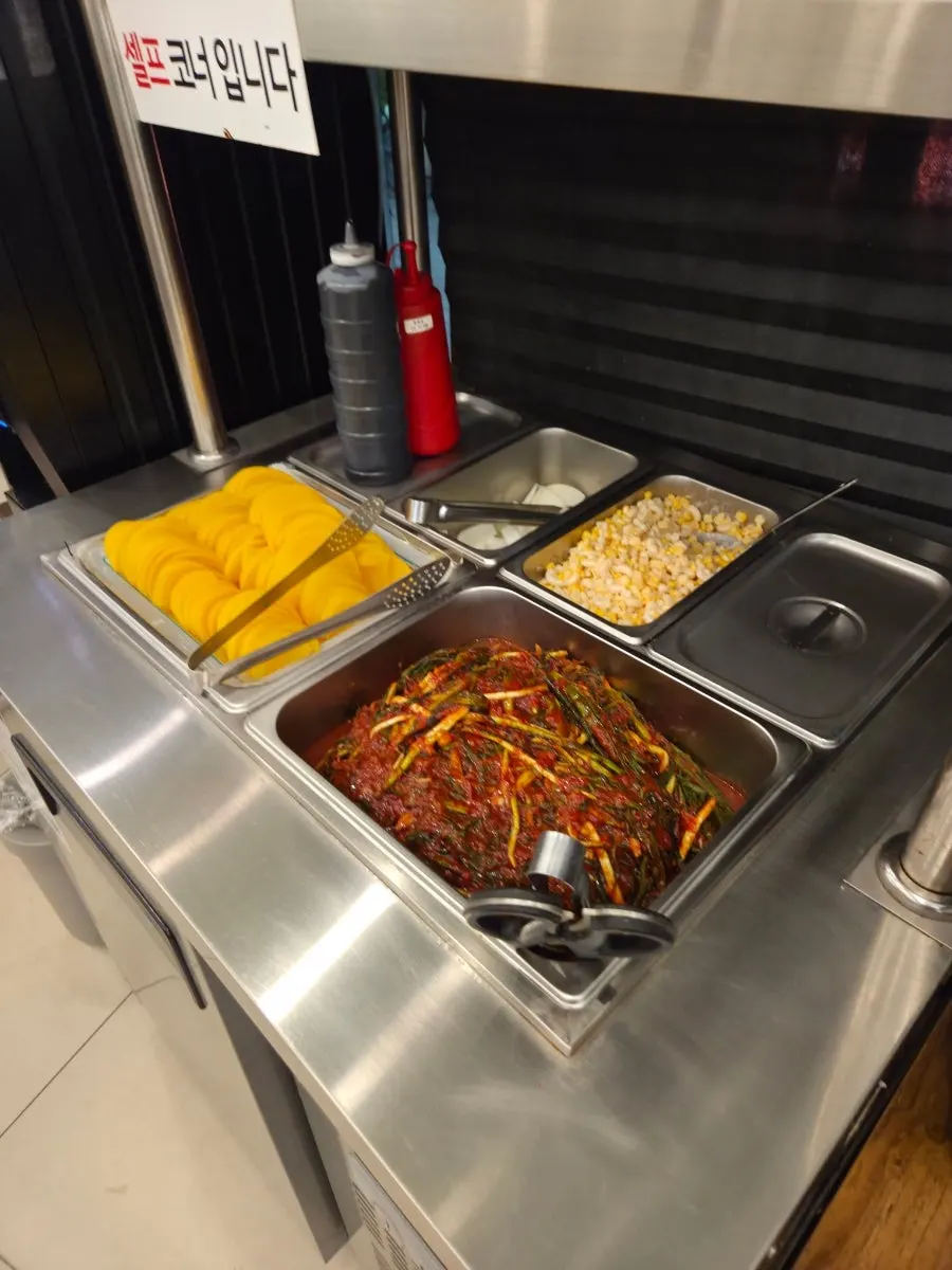 Self-serve bar with unlimited rice refills at Mayway