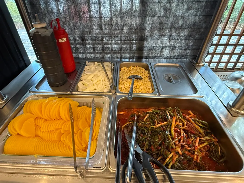 Basic side dishes laid out at the self-serve bar