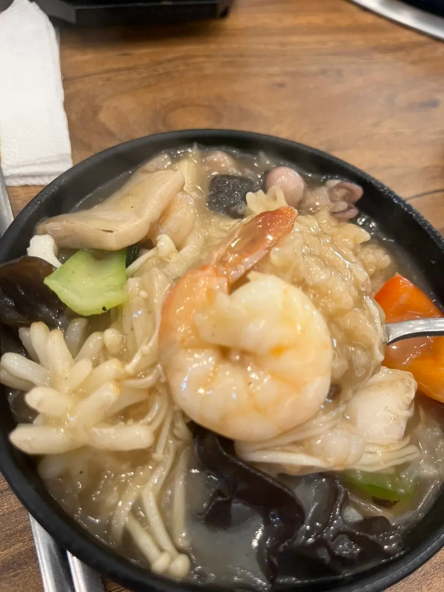 Thick seafood broth with shrimp and mushrooms