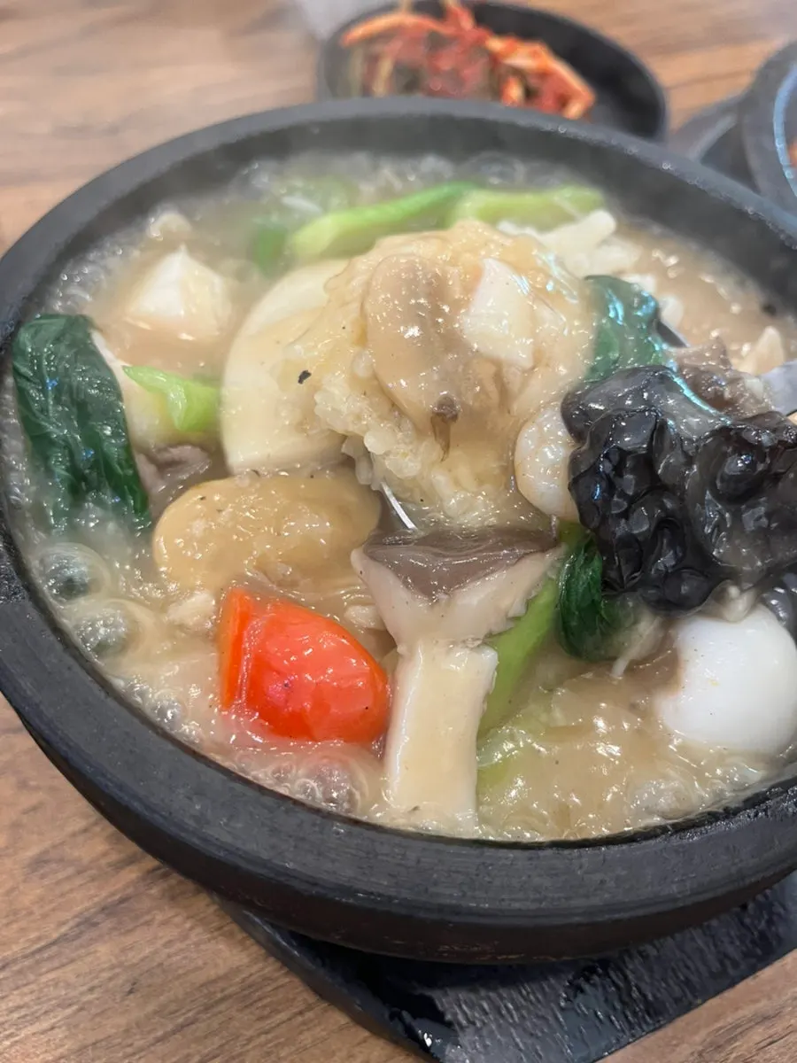 A spoonful of shrimp and scorched rice together