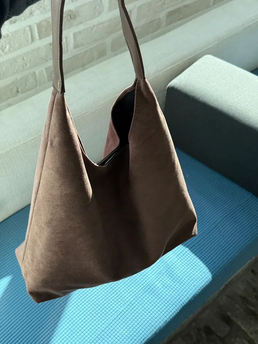 Meda Bag suede bag worn to match an outfit