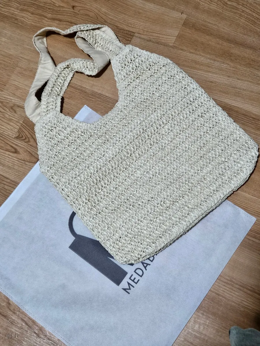 Rattan shoulder bag introduced with its basic details