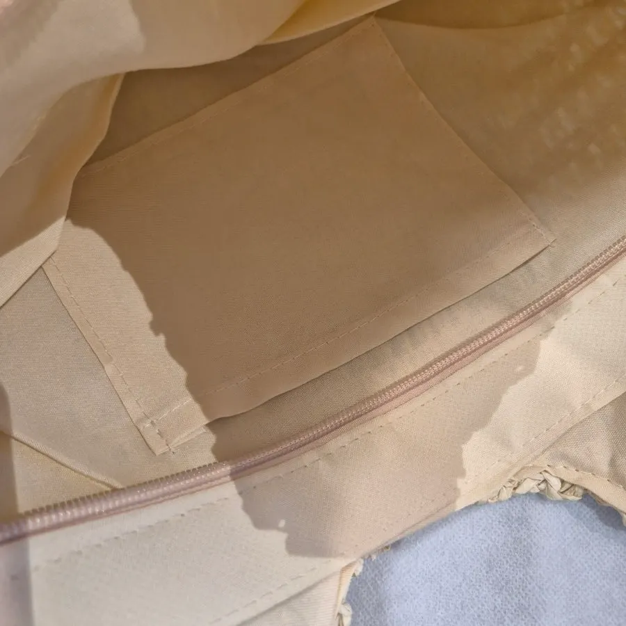 Weave and interior of the Meda Bag rattan shoulder bag