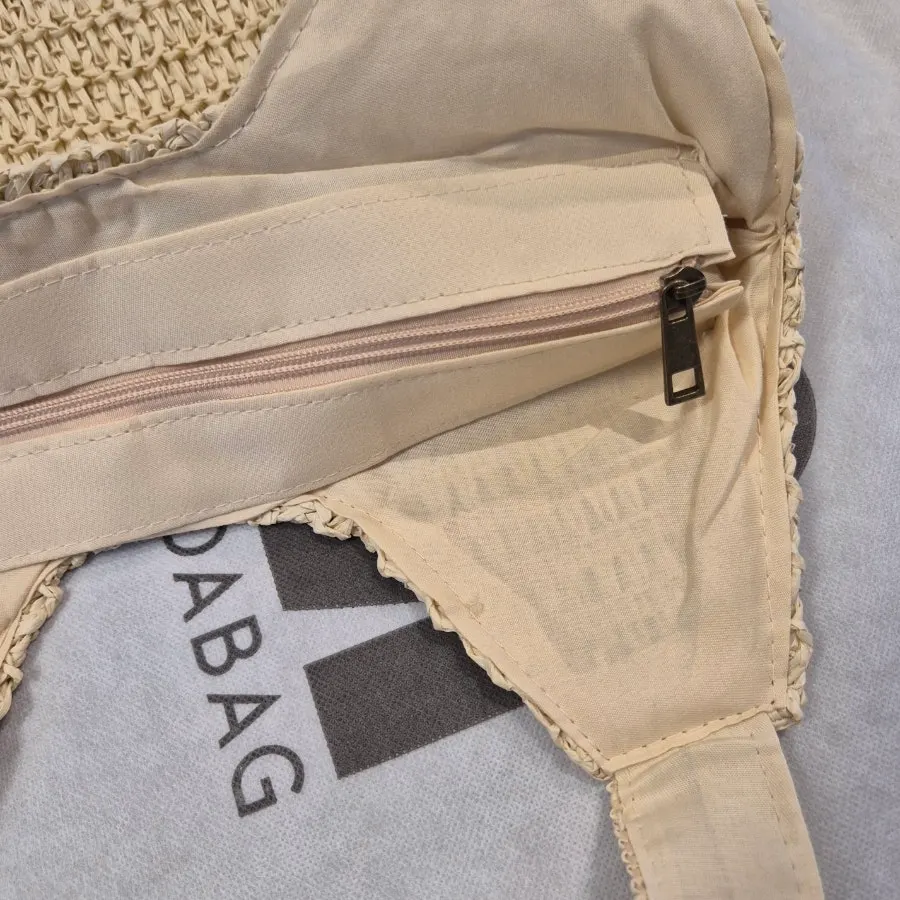 Interior space and lining of the Meda Bag rattan bag