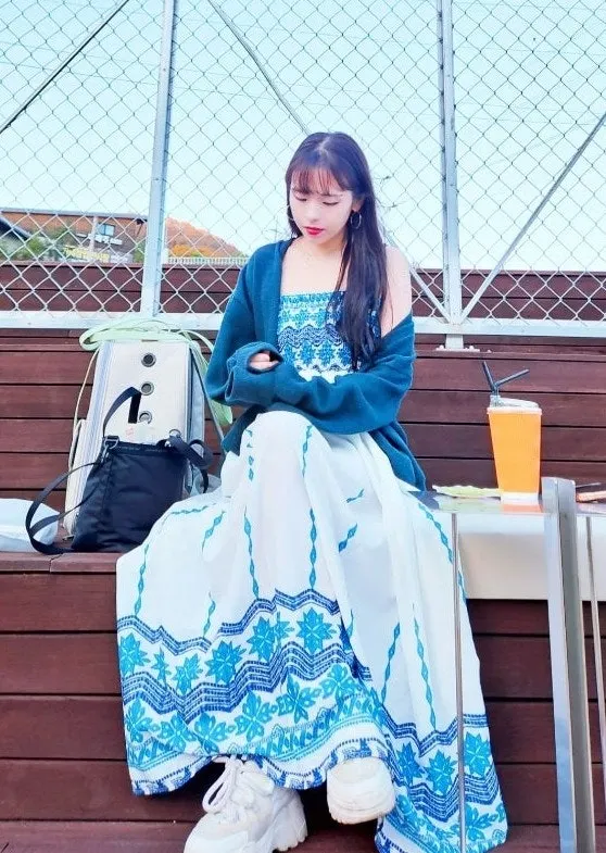 Summer dress chosen to wear with the rattan bag