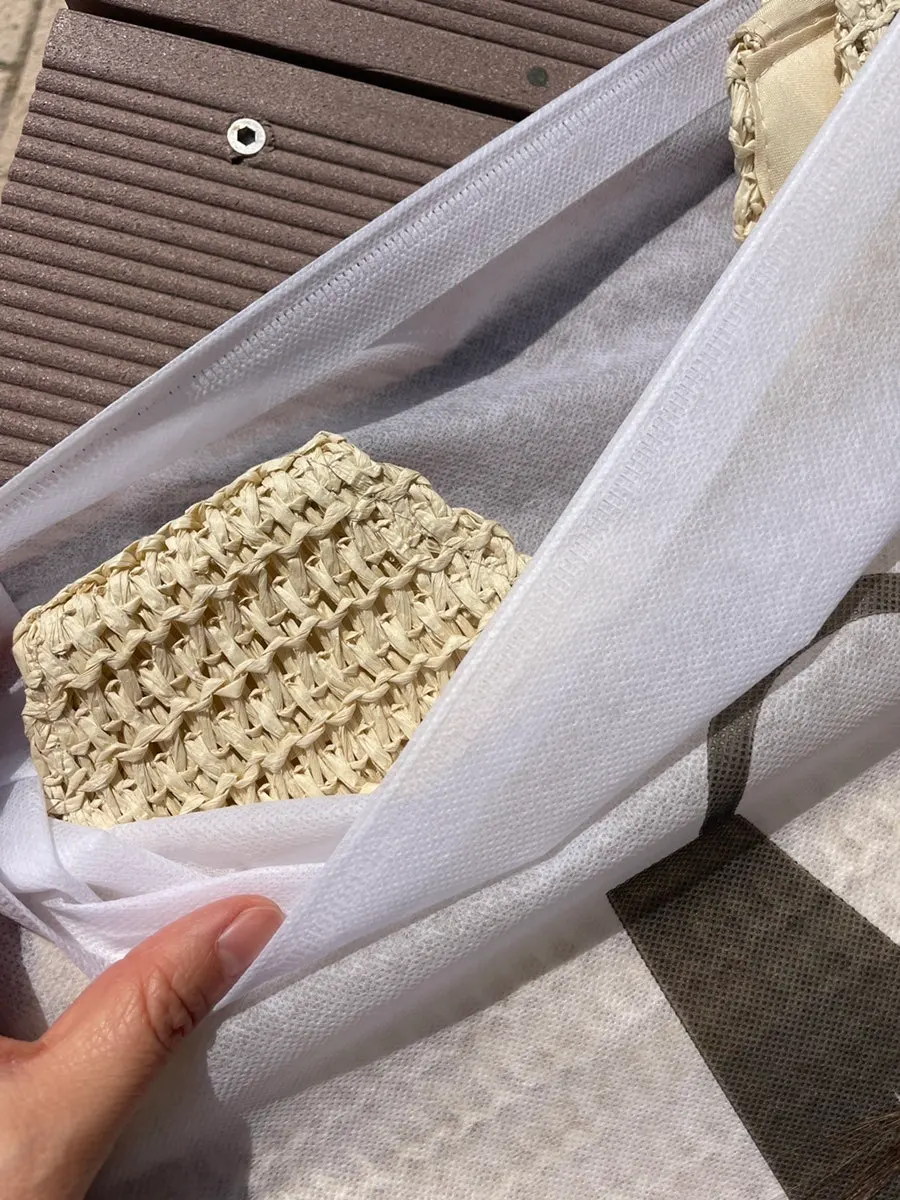 Delivery packaging and contents of the Meda Bag rattan bag