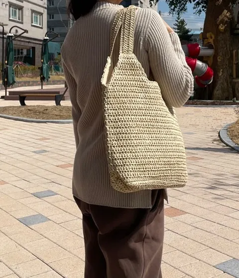 Outfit paired with the beige Meda Bag rattan bag