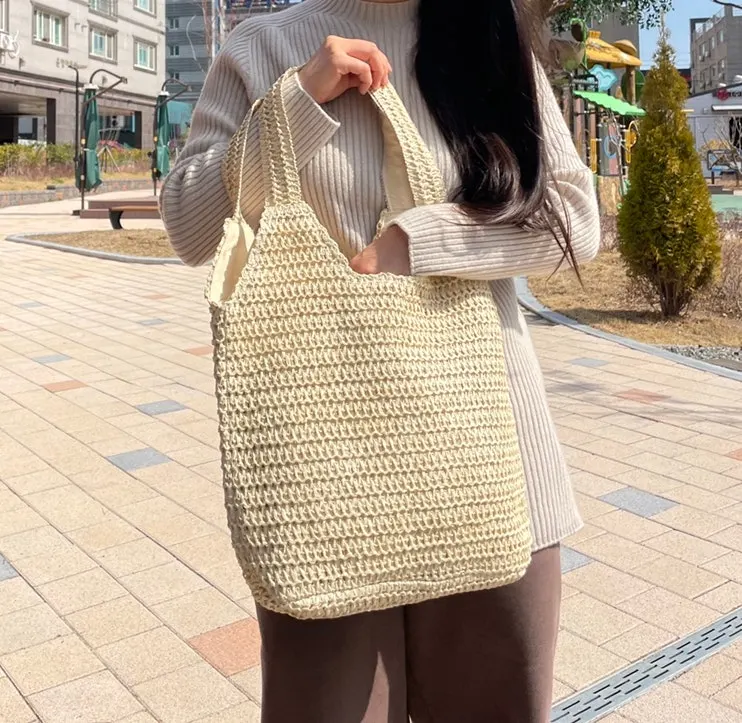 Meda Bag outfit styling with a beige rattan bag