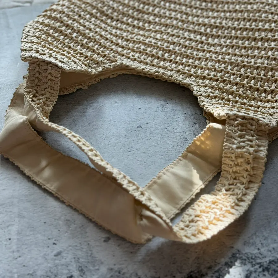 Meda Bag rattan shoulder bag worn over the shoulder