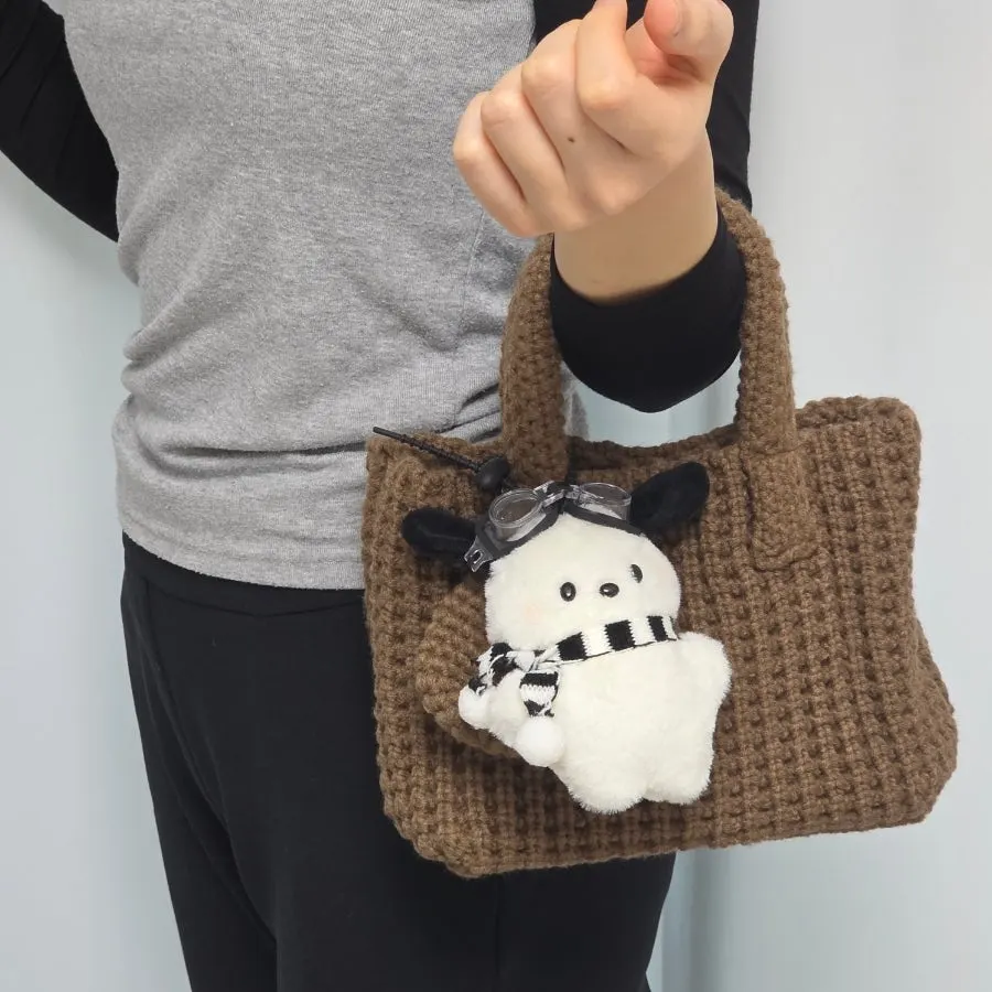 Meda Bag Mini Tote Bag carried on a café outing