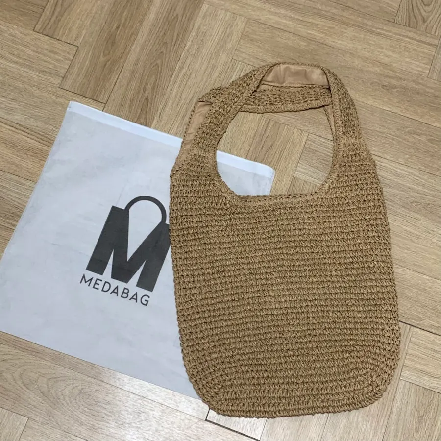 Meda Bag rattan bag supplied with a dust bag