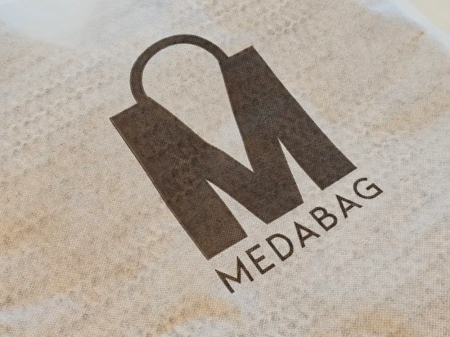 Meda Bag rattan bag and earrings to style together