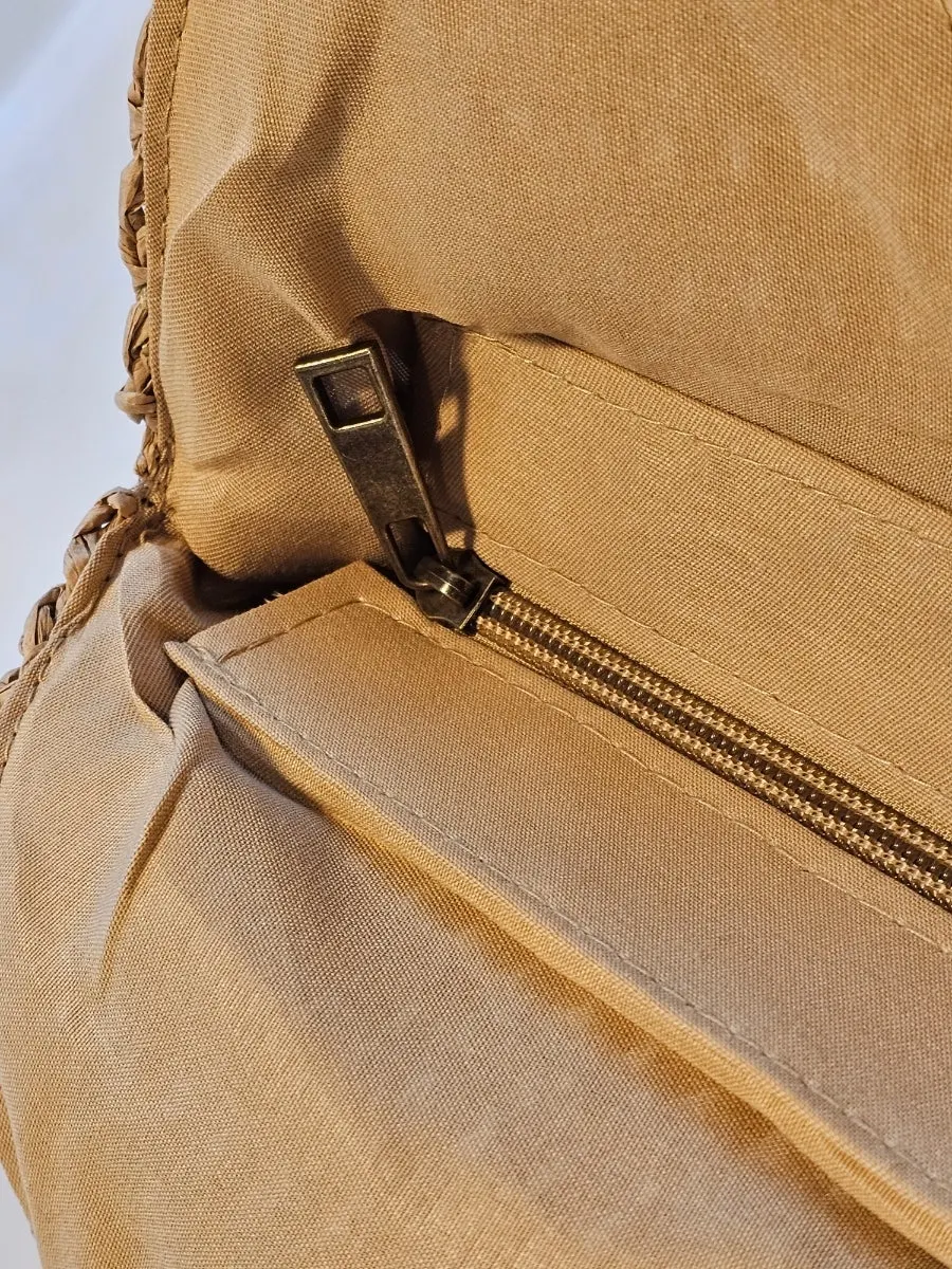 Roomy storage area of the Meda Bag rattan bag