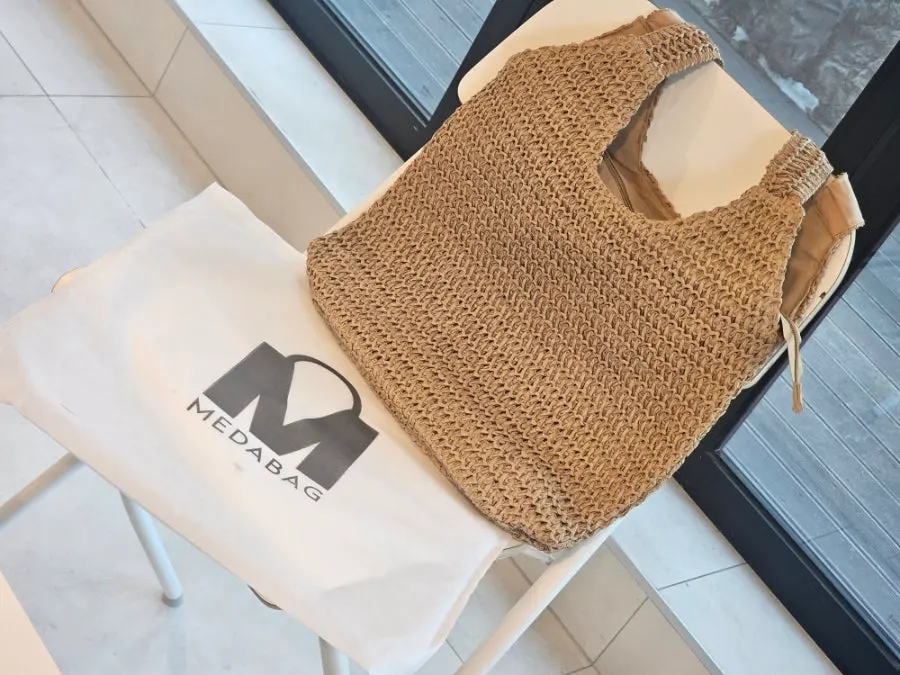 Soft fabric finish on the rattan bag shoulder area