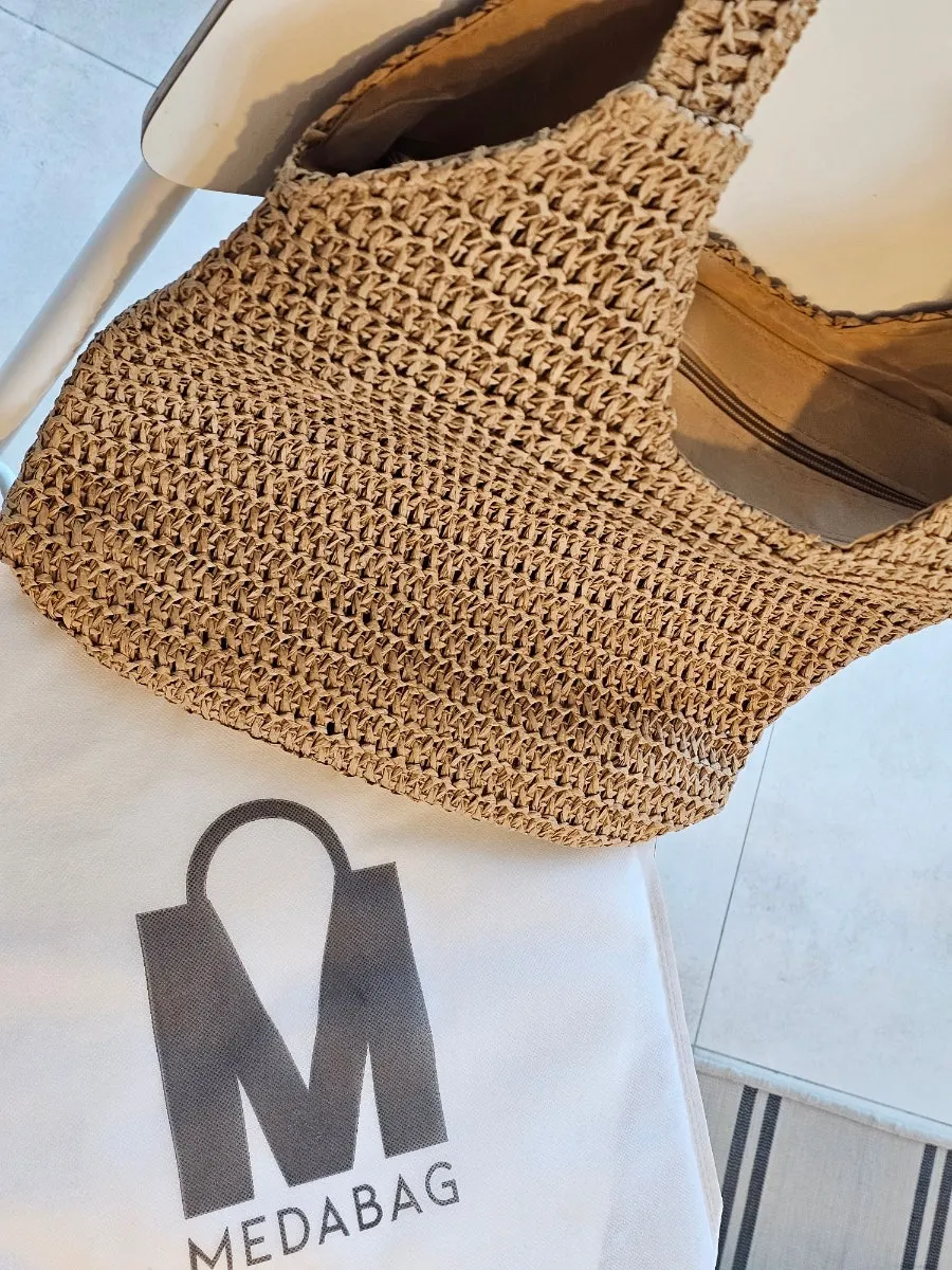 Shoulder rattan bag chosen for travel and everyday summer use