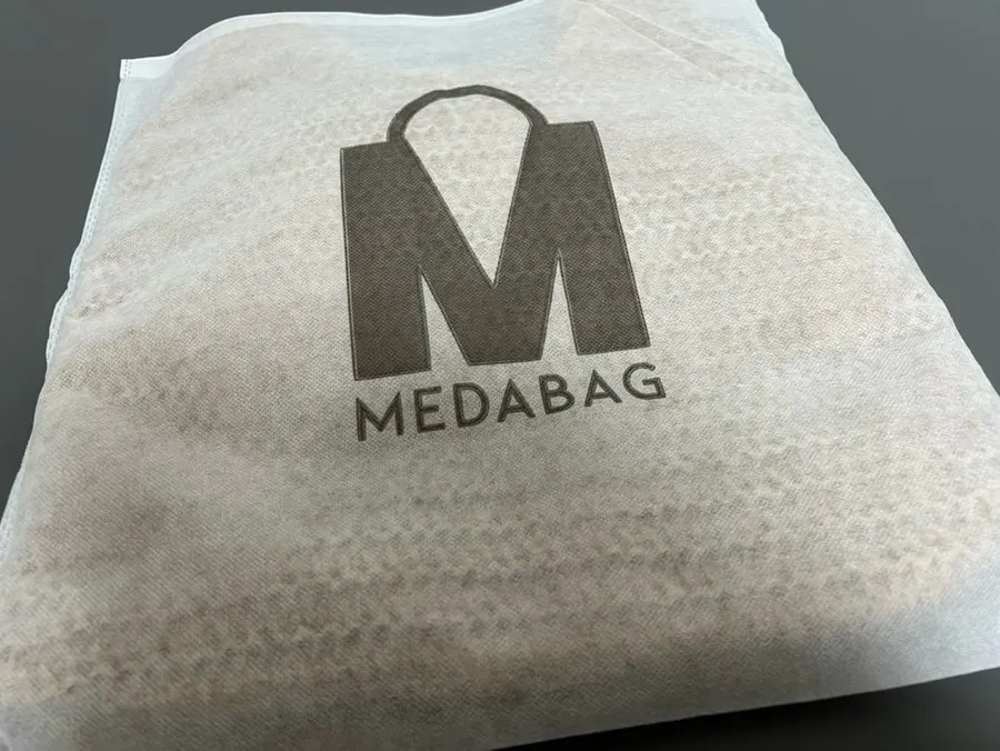 Packaging when the Meda Bag rattan shoulder bag arrived