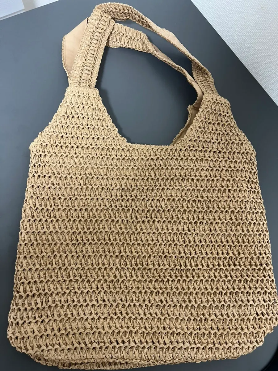 Brown rattan shoulder bag with the same shape on front and back