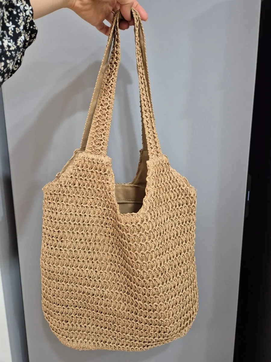 Meda Bag Rattan Bag examined while getting ready to go out