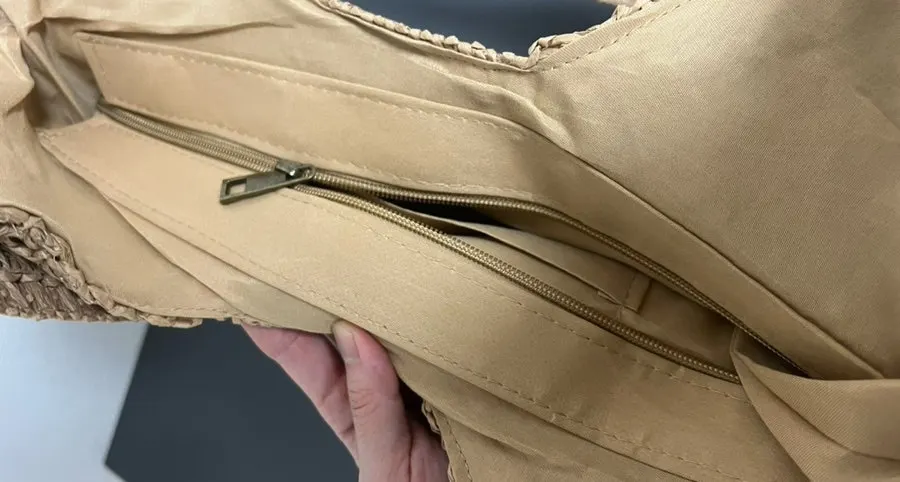 Inside of the rattan bag handle covered with soft fabric