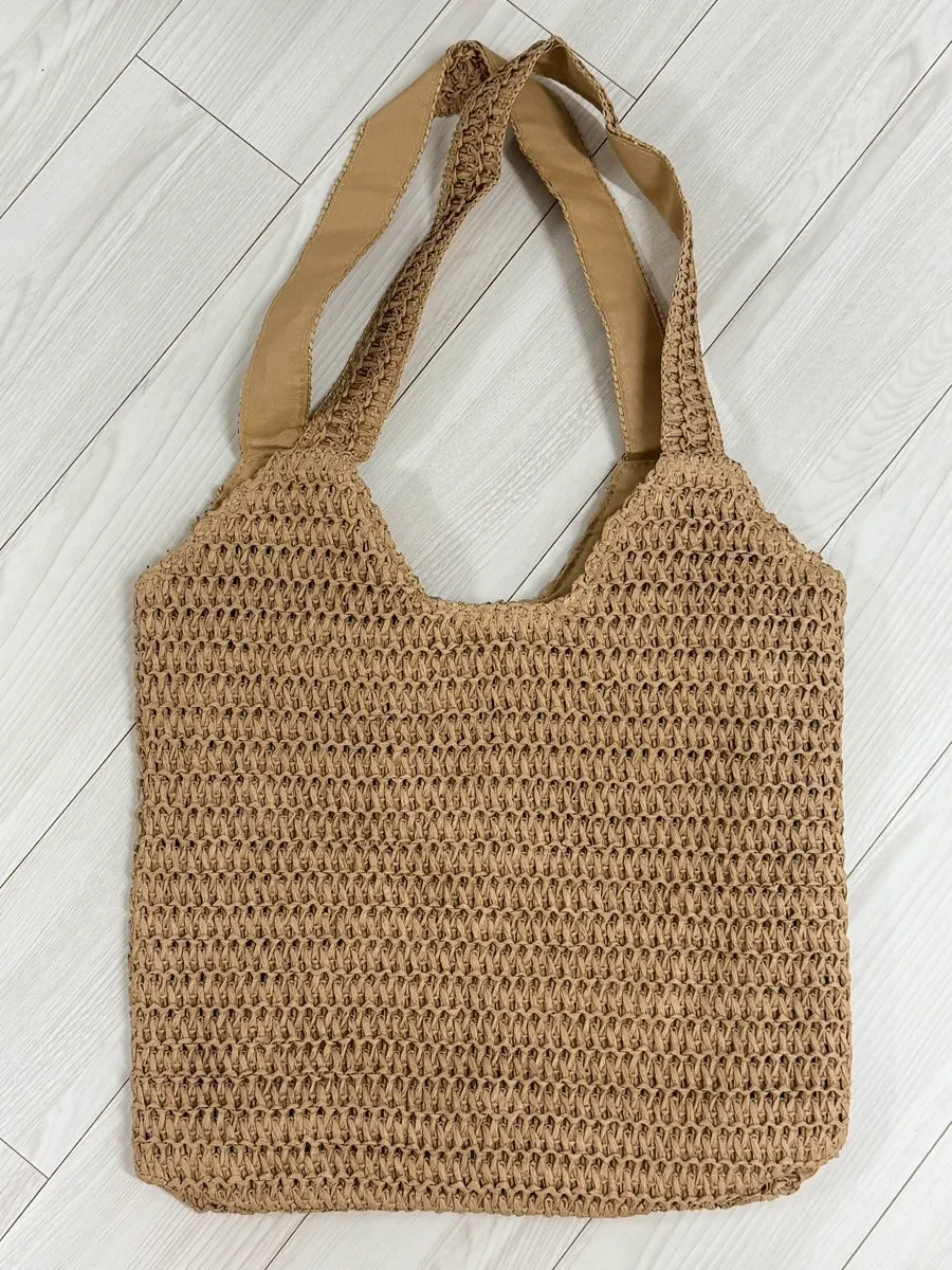 Meda Bag net rattan bag examined during use