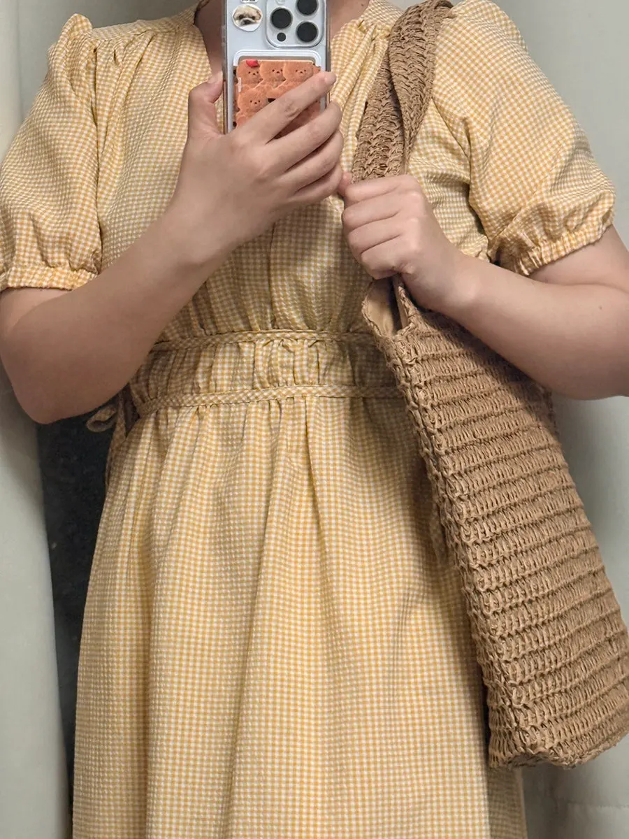 Brown Meda Bag rattan bag examined for travel